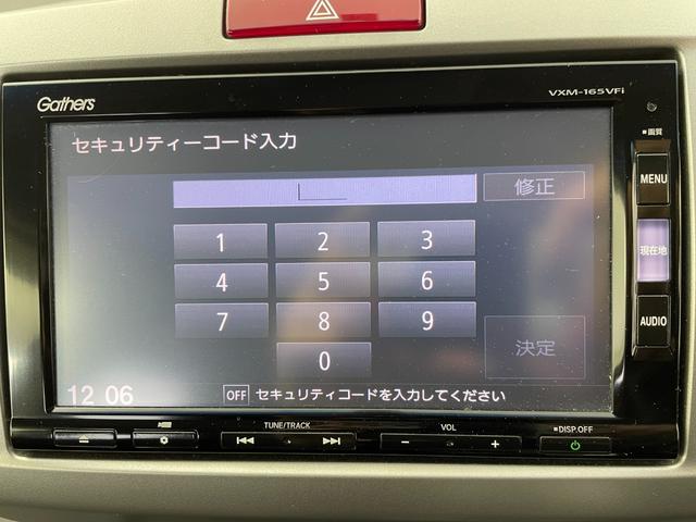 フリード Ｇ　プレミアムエディション　純正７インチナビ　バックカメラ　両側パワースライドドア　クルーズコントロール　オートライト　ハーフレザーシート　ステアリングリモコン　オートエアコン　ビルトインＥＴＣ　スマートキー　スペアキー　禁煙車（4枚目）