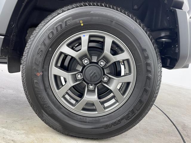 ジムニーノマド FC オーディオレス レーダークルーズコントロール LEDライト ハイビームアシスト シートヒーター 純正15インチAW 背面タイヤ ステアリングリモコン ダウンヒルアシスト スペアキー スマートキー 禁煙(69枚目)