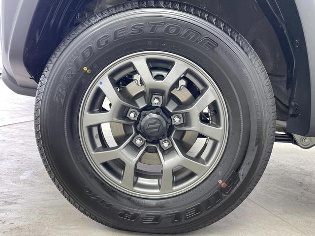 ジムニーノマド FC オーディオレス レーダークルーズコントロール LEDライト ハイビームアシスト シートヒーター 純正15インチAW 背面タイヤ ステアリングリモコン ダウンヒルアシスト スペアキー スマートキー 禁煙(70枚目)