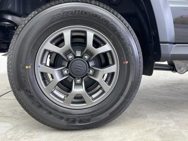 ジムニーノマド FC オーディオレス レーダークルーズコントロール LEDライト ハイビームアシスト シートヒーター 純正15インチAW 背面タイヤ ステアリングリモコン ダウンヒルアシスト スペアキー スマートキー 禁煙(71枚目)