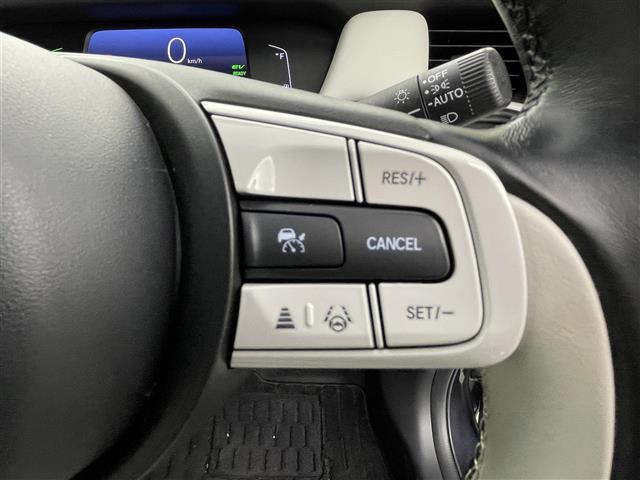 フィット e:HEVホーム 禁煙車 純正ナビ フルセグ バックカメラ ホンダセンシング 追従クルーズコントロール レーンキープアシスト オートライト 前後ドライブレコーダー ETC 横滑り防止装置 フロントガラス熱線スイッチ(6枚目)
