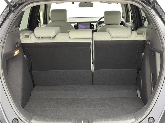 フィット e:HEVホーム 禁煙車 純正ナビ フルセグ バックカメラ ホンダセンシング 追従クルーズコントロール レーンキープアシスト オートライト 前後ドライブレコーダー ETC 横滑り防止装置 フロントガラス熱線スイッチ(36枚目)