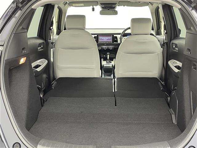 フィット e:HEVホーム 禁煙車 純正ナビ フルセグ バックカメラ ホンダセンシング 追従クルーズコントロール レーンキープアシスト オートライト 前後ドライブレコーダー ETC 横滑り防止装置 フロントガラス熱線スイッチ(37枚目)