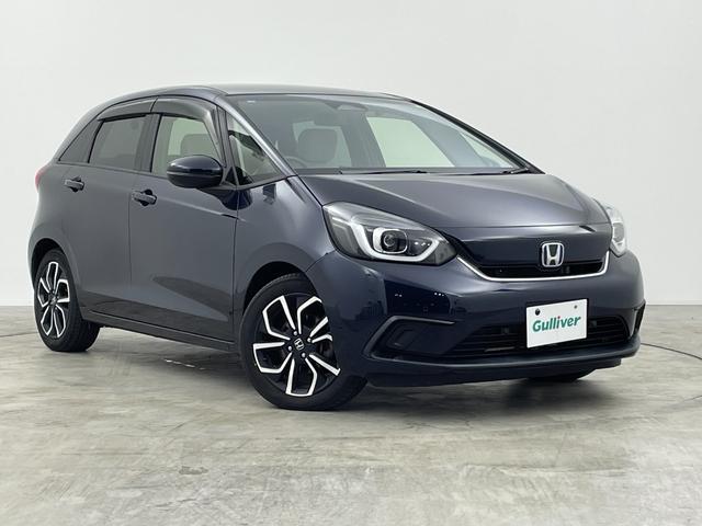 フィット e:HEVホーム 禁煙車 純正ナビ フルセグ バックカメラ ホンダセンシング 追従クルーズコントロール レーンキープアシスト オートライト 前後ドライブレコーダー ETC 横滑り防止装置 フロントガラス熱線スイッチ(49枚目)