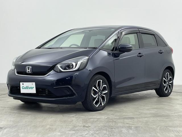 フィット e:HEVホーム 禁煙車 純正ナビ フルセグ バックカメラ ホンダセンシング 追従クルーズコントロール レーンキープアシスト オートライト 前後ドライブレコーダー ETC 横滑り防止装置 フロントガラス熱線スイッチ(51枚目)