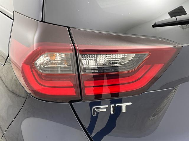 フィット e:HEVホーム 禁煙車 純正ナビ フルセグ バックカメラ ホンダセンシング 追従クルーズコントロール レーンキープアシスト オートライト 前後ドライブレコーダー ETC 横滑り防止装置 フロントガラス熱線スイッチ(61枚目)