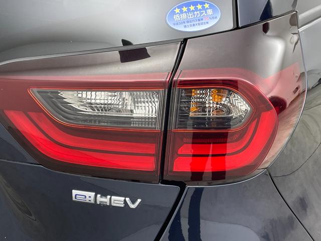 フィット e:HEVホーム 禁煙車 純正ナビ フルセグ バックカメラ ホンダセンシング 追従クルーズコントロール レーンキープアシスト オートライト 前後ドライブレコーダー ETC 横滑り防止装置 フロントガラス熱線スイッチ(62枚目)