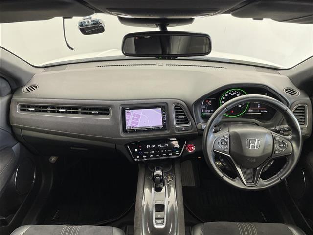 ヴェゼル ハイブリッドRS・ホンダセンシング 純正ナビ バックカメラ 衝突軽減 アダプティブクルーズコントロール レーンアシスト シートヒーター 横滑り防止 アイドリングストップ ETC オートライト スマートキー プッシュスタート 禁煙車(2枚目)