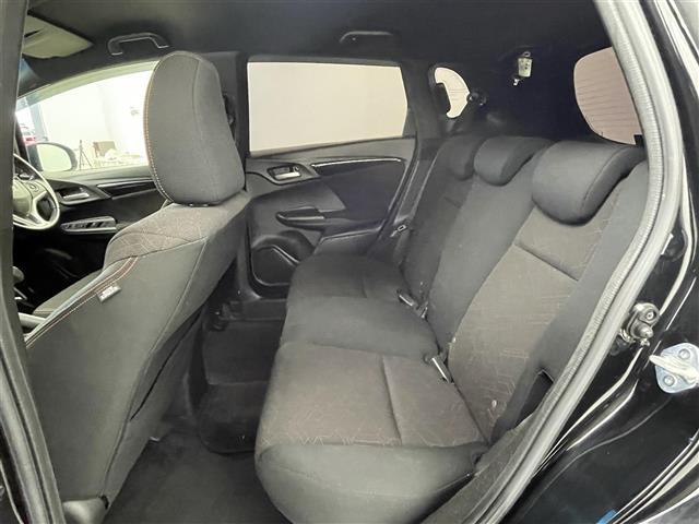 フィットハイブリッド Sパッケージ 純正7インチナビ クルーズコントロール LEDライト 純正16インチアルミホイール ステアリングリモコン パドルシフト アイドリングストップ 横滑り防止装置 オートエアコン スマートキー 禁煙車(23枚目)