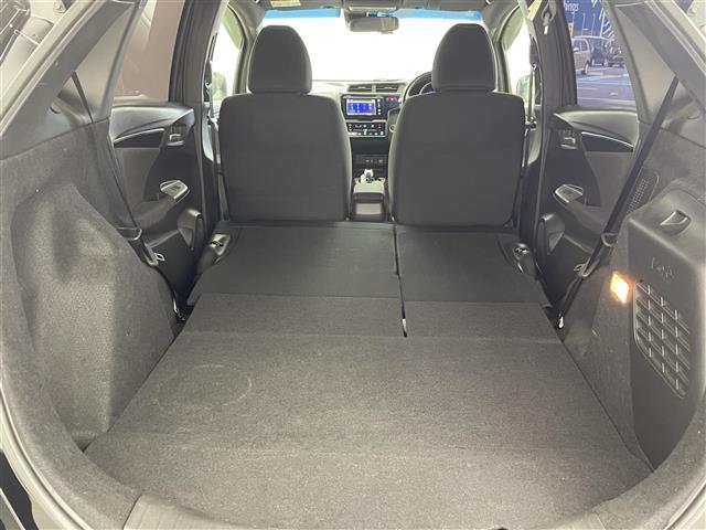 フィットハイブリッド Sパッケージ 純正7インチナビ クルーズコントロール LEDライト 純正16インチアルミホイール ステアリングリモコン パドルシフト アイドリングストップ 横滑り防止装置 オートエアコン スマートキー 禁煙車(25枚目)