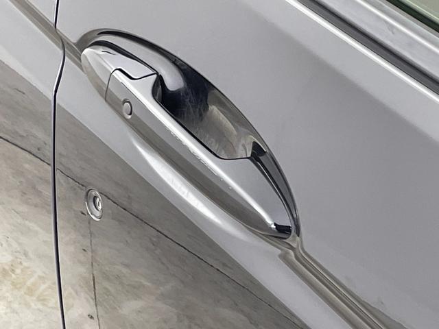 フィットハイブリッド Sパッケージ 純正7インチナビ クルーズコントロール LEDライト 純正16インチアルミホイール ステアリングリモコン パドルシフト アイドリングストップ 横滑り防止装置 オートエアコン スマートキー 禁煙車(57枚目)