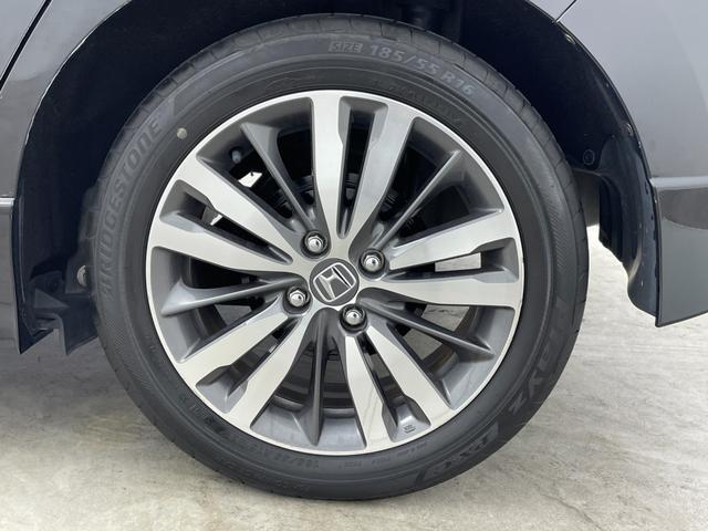 フィットハイブリッド Sパッケージ 純正7インチナビ クルーズコントロール LEDライト 純正16インチアルミホイール ステアリングリモコン パドルシフト アイドリングストップ 横滑り防止装置 オートエアコン スマートキー 禁煙車(69枚目)