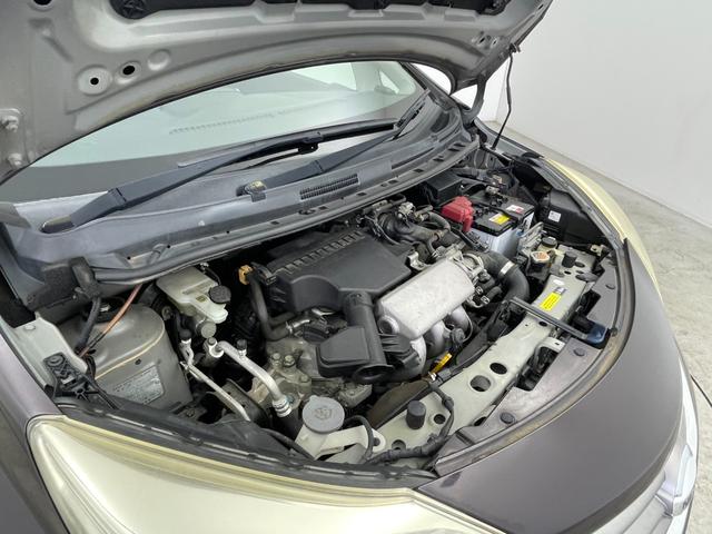 ノート Ｘ　ＤＩＧ－Ｓ　純正７インチナビ　バックカメラ　ヘッドライトレベライザー　純正１４インチアルミホイール　オートエアコン　横滑り防止装置　盗難防止装置　スマートキー　プッシュスタート　ＥＴＣ　アイドリングストップ　禁煙（79枚目）