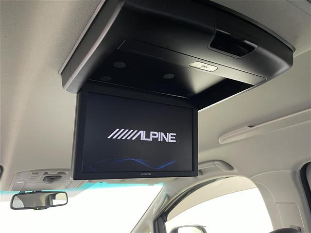 ヴェルファイア ２．４Ｚ　ゴールデンアイズ　フリップダウンモニター　純正８インチナビ　バックカメラ　両側パワースライドドア　クルーズコントロール　ＨＩＤオートライト　ハーフレザーシート　オットマン　パワーバックドア　スマートキー　ＥＴＣ　禁煙車（6枚目）