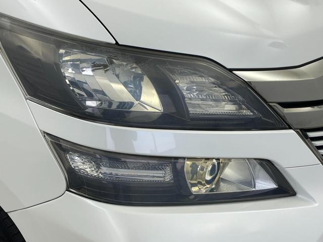 ヴェルファイア ２．４Ｚ　ゴールデンアイズ　フリップダウンモニター　純正８インチナビ　バックカメラ　両側パワースライドドア　クルーズコントロール　ＨＩＤオートライト　ハーフレザーシート　オットマン　パワーバックドア　スマートキー　ＥＴＣ　禁煙車（53枚目）