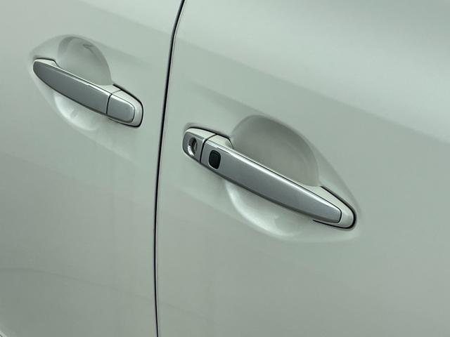 ヴェルファイア ２．４Ｚ　ゴールデンアイズ　フリップダウンモニター　純正８インチナビ　バックカメラ　両側パワースライドドア　クルーズコントロール　ＨＩＤオートライト　ハーフレザーシート　オットマン　パワーバックドア　スマートキー　ＥＴＣ　禁煙車（56枚目）