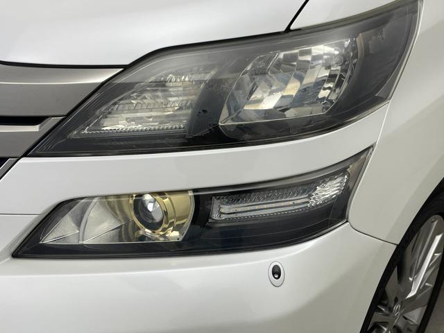 ヴェルファイア ２．４Ｚ　ゴールデンアイズ　フリップダウンモニター　純正８インチナビ　バックカメラ　両側パワースライドドア　クルーズコントロール　ＨＩＤオートライト　ハーフレザーシート　オットマン　パワーバックドア　スマートキー　ＥＴＣ　禁煙車（57枚目）