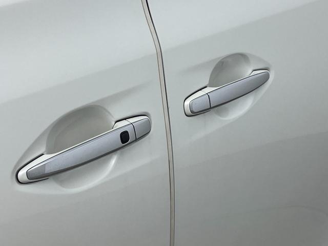 ヴェルファイア ２．４Ｚ　ゴールデンアイズ　フリップダウンモニター　純正８インチナビ　バックカメラ　両側パワースライドドア　クルーズコントロール　ＨＩＤオートライト　ハーフレザーシート　オットマン　パワーバックドア　スマートキー　ＥＴＣ　禁煙車（61枚目）