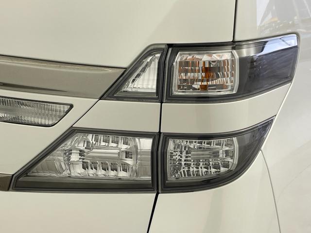 ヴェルファイア ２．４Ｚ　ゴールデンアイズ　フリップダウンモニター　純正８インチナビ　バックカメラ　両側パワースライドドア　クルーズコントロール　ＨＩＤオートライト　ハーフレザーシート　オットマン　パワーバックドア　スマートキー　ＥＴＣ　禁煙車（62枚目）