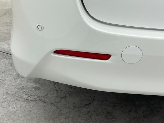 ヴェルファイア ２．４Ｚ　ゴールデンアイズ　フリップダウンモニター　純正８インチナビ　バックカメラ　両側パワースライドドア　クルーズコントロール　ＨＩＤオートライト　ハーフレザーシート　オットマン　パワーバックドア　スマートキー　ＥＴＣ　禁煙車（65枚目）