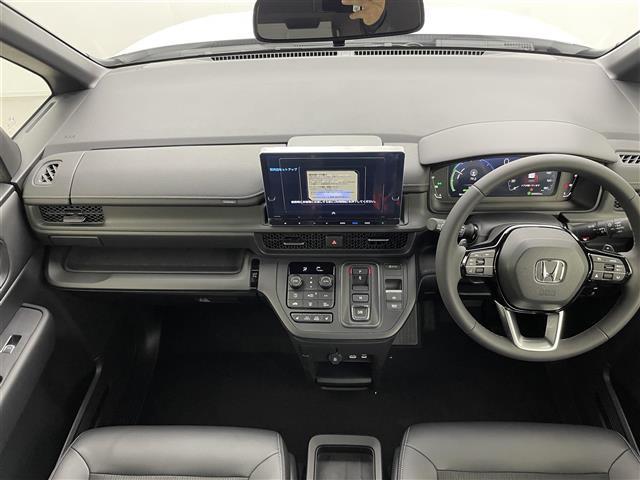 ステップワゴン e:HEVスパーダ 登録済未使用車 純正11インチナビ バックカメラ 両側パワースライドドア アダプティブクルーズコントロール シートヒーター 純正16インチAW ステアリングリモコン コーナーセンサー プッシュスタート(2枚目)