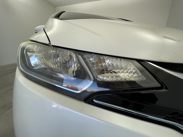 フィットハイブリッド Ｆパッケージ　純正ナビ　バックカメラ　ＥＴＣ　前後ドラレコ　フルセグＴＶ　ＨＩＤヘッドライト　ライトリベライザー　ＵＳＢ入力端子　プッシュスタートボタン　スマートキー　ステアリングスイッチ　横滑り防止装置　禁煙車（58枚目）