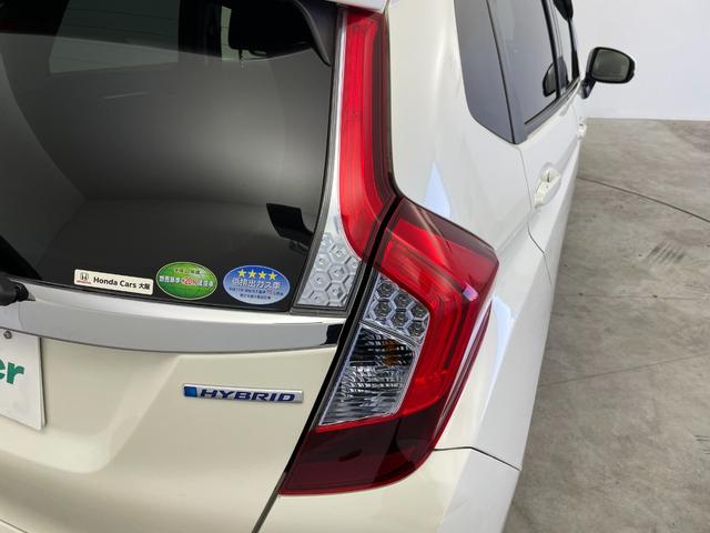 フィットハイブリッド Ｆパッケージ　純正ナビ　バックカメラ　ＥＴＣ　前後ドラレコ　フルセグＴＶ　ＨＩＤヘッドライト　ライトリベライザー　ＵＳＢ入力端子　プッシュスタートボタン　スマートキー　ステアリングスイッチ　横滑り防止装置　禁煙車（65枚目）