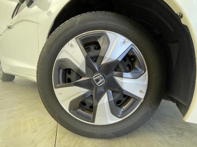 フィットハイブリッド Ｆパッケージ　純正ナビ　バックカメラ　ＥＴＣ　前後ドラレコ　フルセグＴＶ　ＨＩＤヘッドライト　ライトリベライザー　ＵＳＢ入力端子　プッシュスタートボタン　スマートキー　ステアリングスイッチ　横滑り防止装置　禁煙車（67枚目）