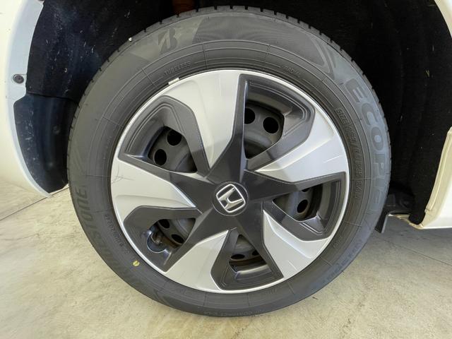 フィットハイブリッド Ｆパッケージ　純正ナビ　バックカメラ　ＥＴＣ　前後ドラレコ　フルセグＴＶ　ＨＩＤヘッドライト　ライトリベライザー　ＵＳＢ入力端子　プッシュスタートボタン　スマートキー　ステアリングスイッチ　横滑り防止装置　禁煙車（69枚目）