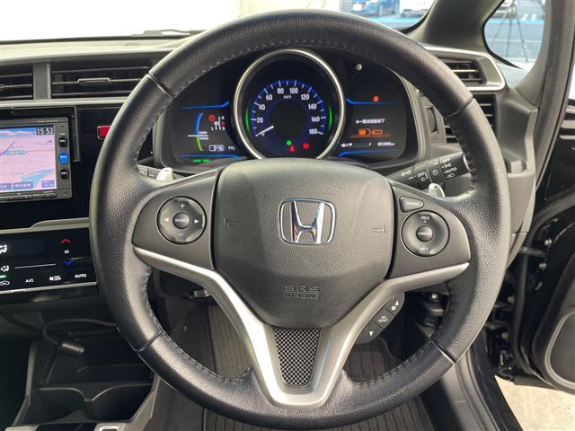 フィットハイブリッド Ｓパッケージ　禁煙車　衝突軽減ブレーキ　純正７インチナビ　バックカメラ　クルーズコントロール　ＬＥＤライト　純正１６インチアルミホイール　ステアリングリモコン　パドルシフト　ＥＴＣ　ドライブレコーダー　スマートキー（22枚目）