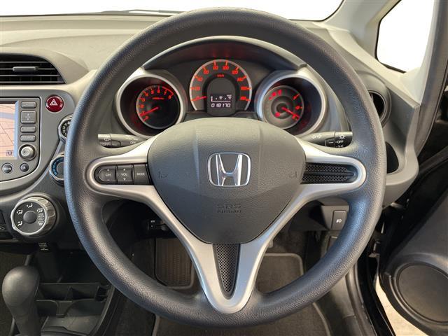 フィット Ｇ　スマートスタイルエディション　純正ナビ　ビルトインＥＴＣ　キノセンヘッドランプ　オートライト　フォグランプ　衝突被害軽減ブレーキ　チップアップシート　エアコン　スマートキー　電動格納ミラー　フロアマット　ステアリングスイッチ　禁煙（10枚目）