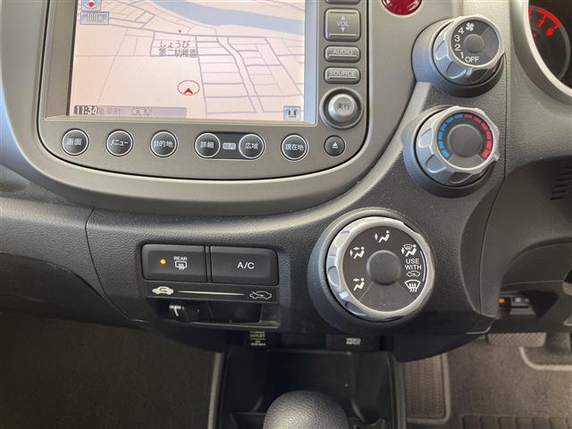 フィット Ｇ　スマートスタイルエディション　純正ナビ　ビルトインＥＴＣ　キノセンヘッドランプ　オートライト　フォグランプ　衝突被害軽減ブレーキ　チップアップシート　エアコン　スマートキー　電動格納ミラー　フロアマット　ステアリングスイッチ　禁煙（18枚目）