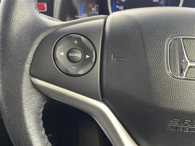 フィットハイブリッド Ｌパッケージ　純正８型ナビ　バックカメラ　ワンセグＴＶ　ＥＴＣ　オートライト　キノセンヘッドライト　衝突被害軽減システム　クルーズコントロール　ＡＢＳ　ハーフレザーシート　スマートキー　オートエアコン　禁煙車（20枚目）