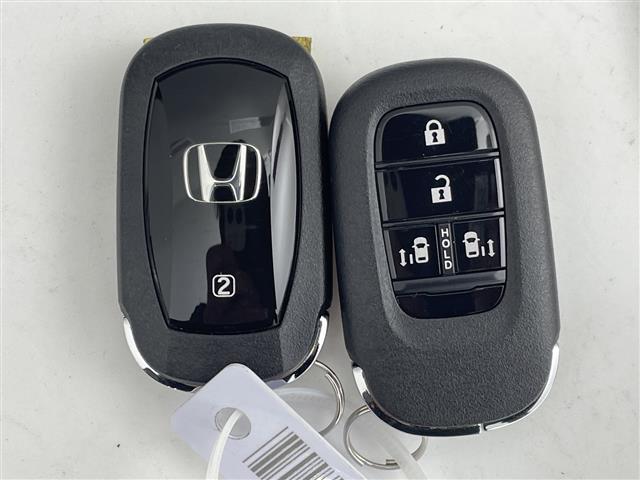 フリード エアー　ＥＸ　登録済未使用車　純正９型ナビ　全周囲カメラ　マルチビューカメラシステム　後退出庫サポート　アダプティブクルーズコントロール　両側電動スライドドア　シートヒーター　ＢＳＭ　ＬＥＤ　衝突被害軽減ブレーキ（12枚目）