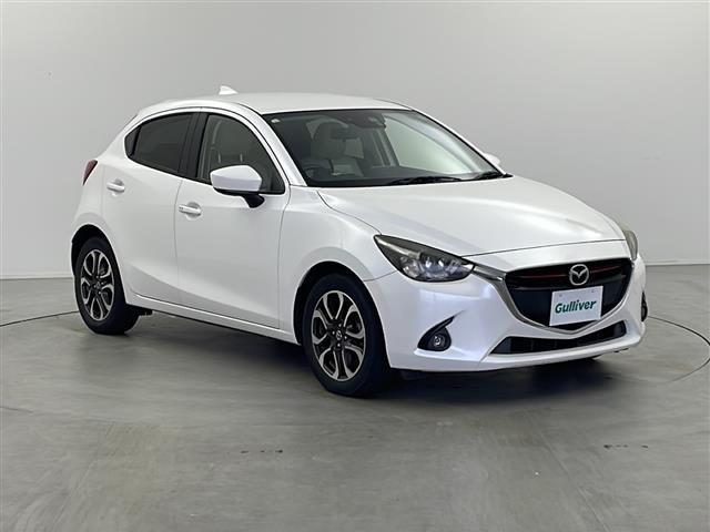 デミオ XDツーリング Lパッケージ 純正ナビ(AM/FM/CD/DVD/Bluetooth) クルーズコントロール スマートキー プッシュスタート 電動格納ミラー 純正フロアマット オートライト 純正アルミホイール(6枚目)