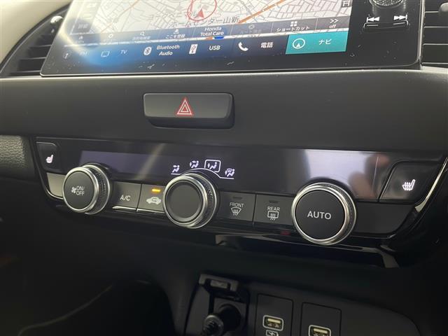 フィット ｅ：ＨＥＶホーム　２０周年特別仕様車　メゾン　純正ナビ　ホンダセンシング　衝突軽減システム　車線逸脱抑制機能　パーキングサポートブレーキ　先行車発進お知らせ　横滑り防止　標識認識機能　追従走行付きクルーズコントロール　ＥＴＣ　ドライブレコーダー（16枚目）