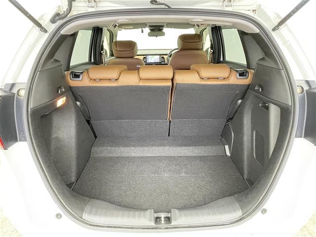 フィット e:HEVリュクス 禁煙 ホンダセンシング 純正9型ナビ バックカメラ シートヒーター ステアリングヒーター ワイヤレス充電 コーナーセンサー ETC キルティングパーフォレーション本革シート 本革巻ステアリングホイール(30枚目)