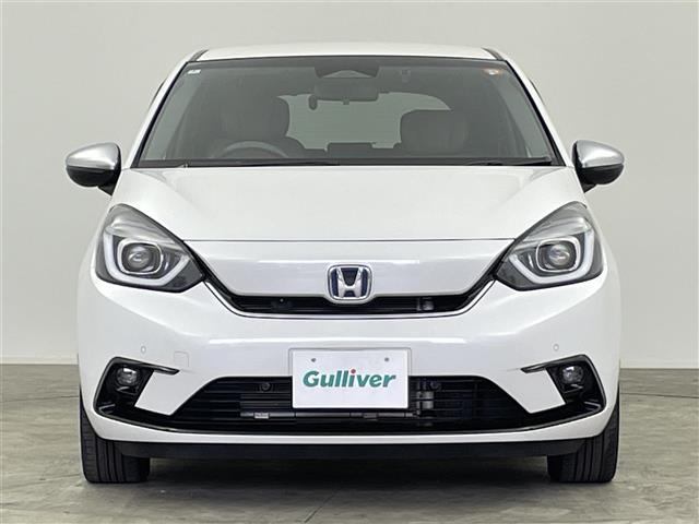フィット e:HEVリュクス 禁煙 ホンダセンシング 純正9型ナビ バックカメラ シートヒーター ステアリングヒーター ワイヤレス充電 コーナーセンサー ETC キルティングパーフォレーション本革シート 本革巻ステアリングホイール(34枚目)