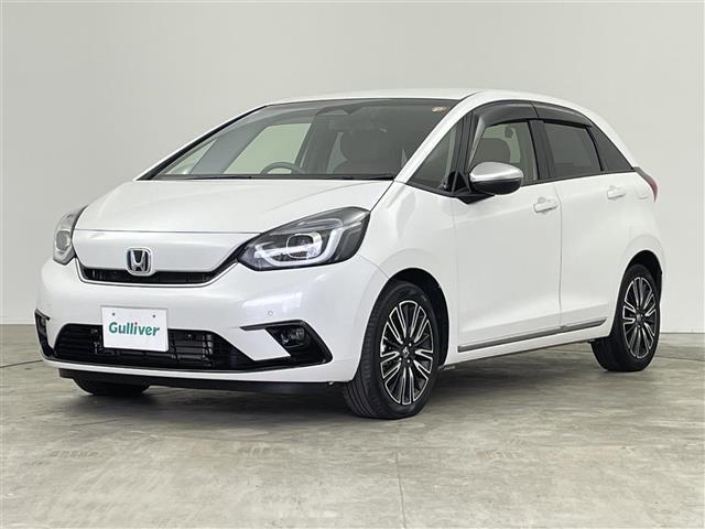 フィット e:HEVリュクス 禁煙 ホンダセンシング 純正9型ナビ バックカメラ シートヒーター ステアリングヒーター ワイヤレス充電 コーナーセンサー ETC キルティングパーフォレーション本革シート 本革巻ステアリングホイール(38枚目)