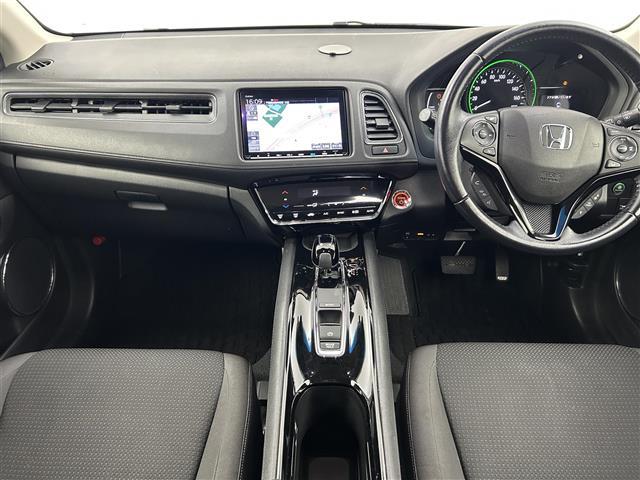 ヴェゼル ハイブリッドX・ホンダセンシング 禁煙車 ホンダセンシング 純正メモリナビ バックカメラ パドルシフト ETC 電子パーキング ブレーキホールド 革巻きステアリング ステアリングスイッチ LEDヘッドライト レーダークルーズコントロー(2枚目)