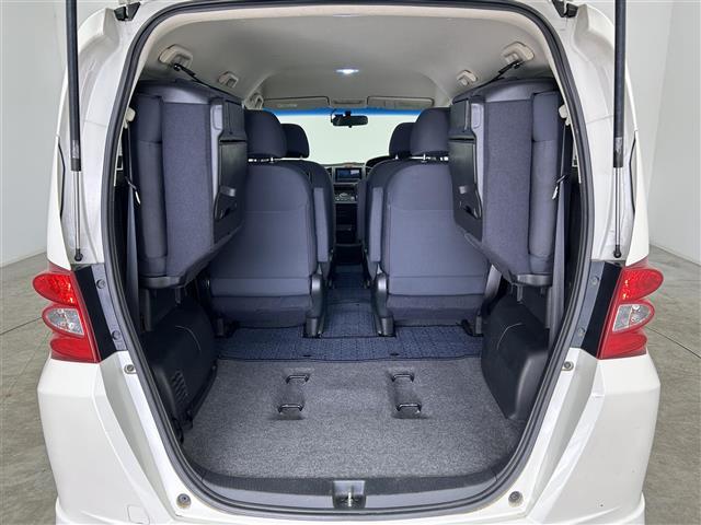 フリード Ｇ　エアロ　ジャストセレクション　禁煙車　社外メモリナビ　片側パワースライドドア　バックカメラ　リモコンキー　ＥＴＣ　電動格納ミラー　純正フロアマット　純正１５インチアルミホイール　フルセグＴＶ　Ｂｌｕｅｔｏｏｔｈ（32枚目）