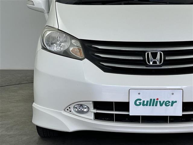 フリード Ｇ　エアロ　ジャストセレクション　禁煙車　社外メモリナビ　片側パワースライドドア　バックカメラ　リモコンキー　ＥＴＣ　電動格納ミラー　純正フロアマット　純正１５インチアルミホイール　フルセグＴＶ　Ｂｌｕｅｔｏｏｔｈ（33枚目）