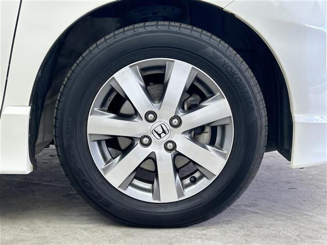 フリード Ｇ　エアロ　ジャストセレクション　禁煙車　社外メモリナビ　片側パワースライドドア　バックカメラ　リモコンキー　ＥＴＣ　電動格納ミラー　純正フロアマット　純正１５インチアルミホイール　フルセグＴＶ　Ｂｌｕｅｔｏｏｔｈ（34枚目）