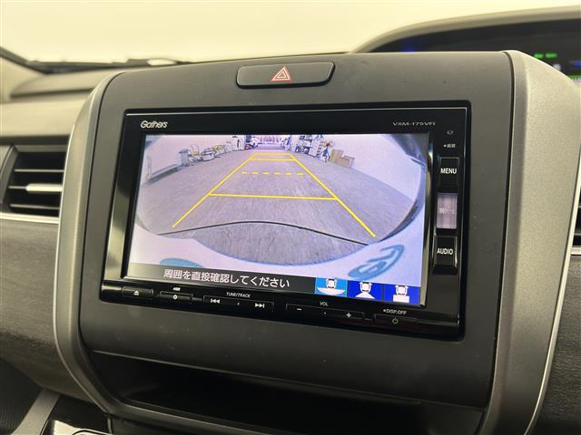 フリードハイブリッド ハイブリッド・Gホンダセンシング 禁煙 純正7型ナビ 両側電動スライドドア LEDヘッドライト レーダークルーズコントロール フルセグTV 電動格納サイドミラー ビルトインETC バックカメラ ハーフレザーシート 純正フロアマット(4枚目)