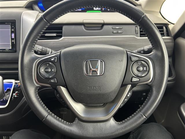 フリードハイブリッド ハイブリッド・Gホンダセンシング 禁煙 純正7型ナビ 両側電動スライドドア LEDヘッドライト レーダークルーズコントロール フルセグTV 電動格納サイドミラー ビルトインETC バックカメラ ハーフレザーシート 純正フロアマット(8枚目)