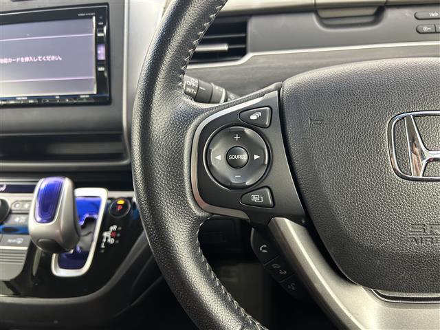 フリードハイブリッド ハイブリッド・Gホンダセンシング 禁煙 純正7型ナビ 両側電動スライドドア LEDヘッドライト レーダークルーズコントロール フルセグTV 電動格納サイドミラー ビルトインETC バックカメラ ハーフレザーシート 純正フロアマット(9枚目)