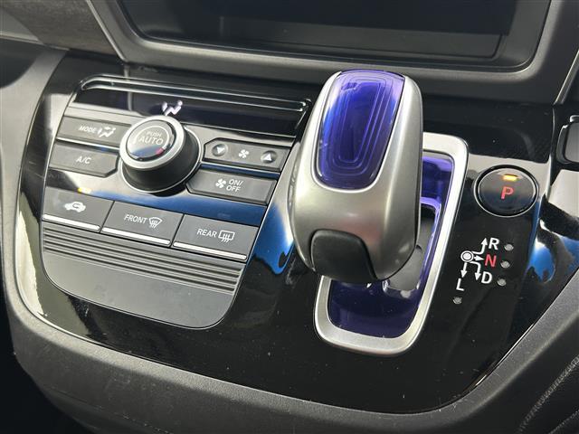 フリードハイブリッド ハイブリッド・Gホンダセンシング 禁煙 純正7型ナビ 両側電動スライドドア LEDヘッドライト レーダークルーズコントロール フルセグTV 電動格納サイドミラー ビルトインETC バックカメラ ハーフレザーシート 純正フロアマット(14枚目)