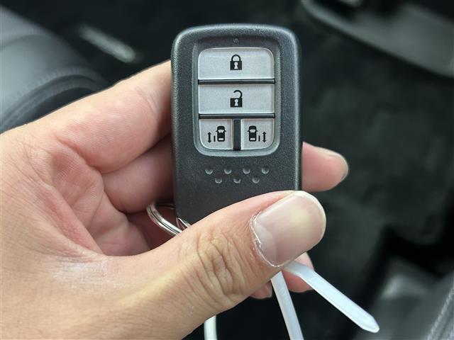 フリードハイブリッド ハイブリッド・Gホンダセンシング 禁煙 純正7型ナビ 両側電動スライドドア LEDヘッドライト レーダークルーズコントロール フルセグTV 電動格納サイドミラー ビルトインETC バックカメラ ハーフレザーシート 純正フロアマット(19枚目)