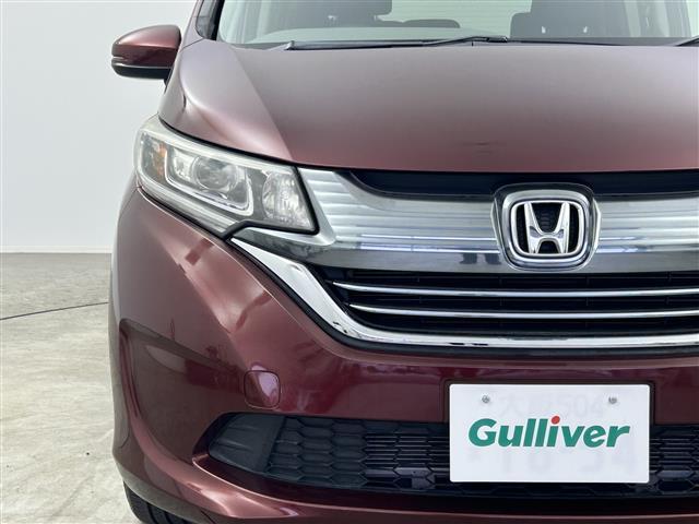 フリードハイブリッド ハイブリッド・Gホンダセンシング 禁煙 純正7型ナビ 両側電動スライドドア LEDヘッドライト レーダークルーズコントロール フルセグTV 電動格納サイドミラー ビルトインETC バックカメラ ハーフレザーシート 純正フロアマット(33枚目)