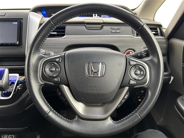 フリードハイブリッド ハイブリッド・EX 禁煙 両側電動スライドドア シートヒーター LEDライト 追従式クルコン 社外7型ナビ Cパッケージ Sパッケージ コンフォートビューパッケージ ビルトインETC ワンセグTV バックカメラ(10枚目)